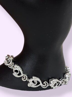 Nadri Rhodium Plated CZ Swirl Tennis Bracelet